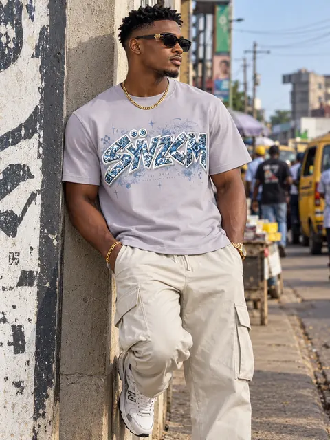 SYVZCM Blue Graffiti T Shirt — Grey on a streetwear model